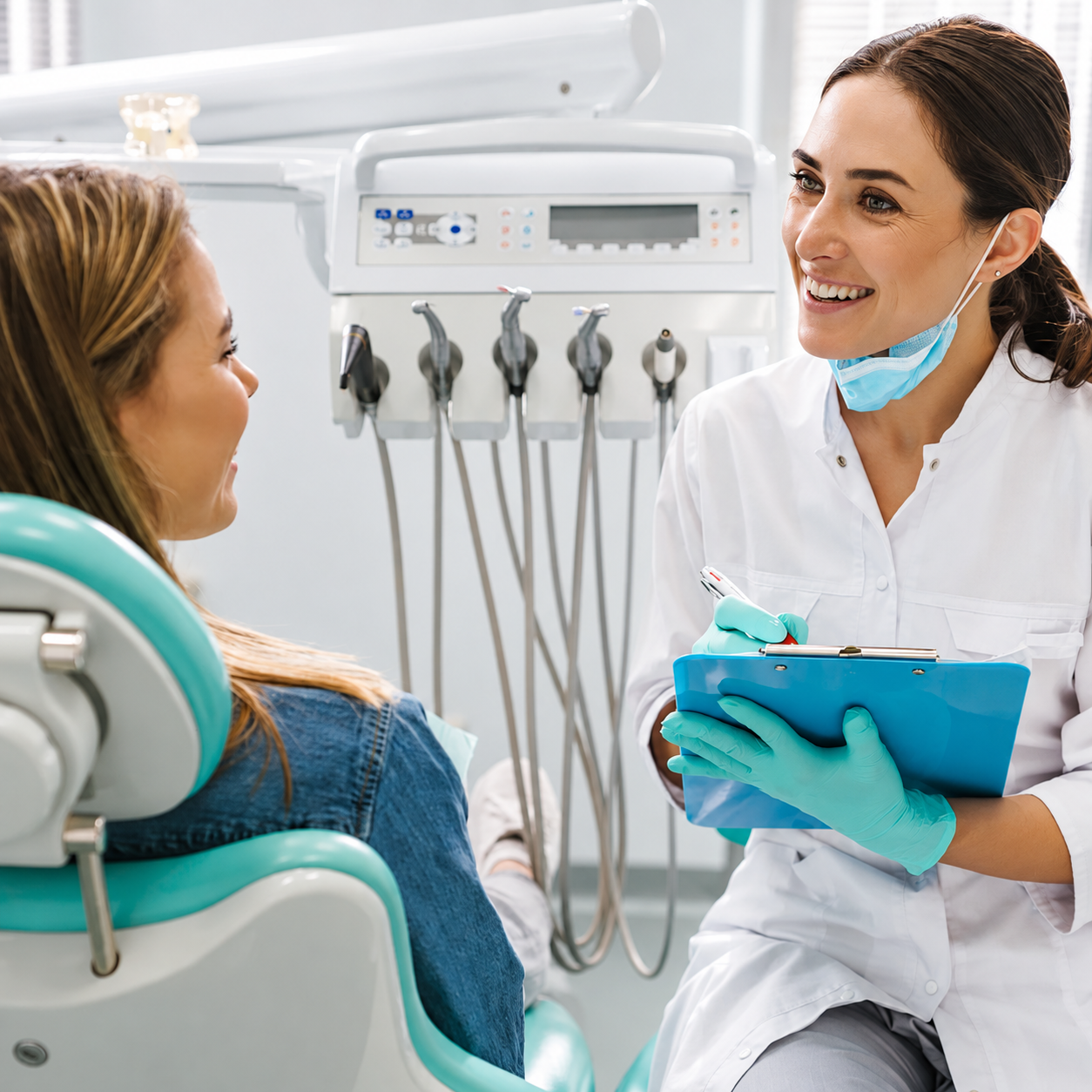 Dentist discussing treatment with a patient